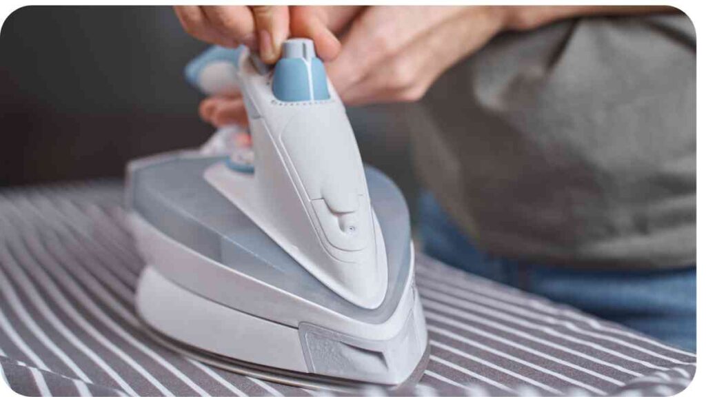 a person is ironing a shirt with an iron